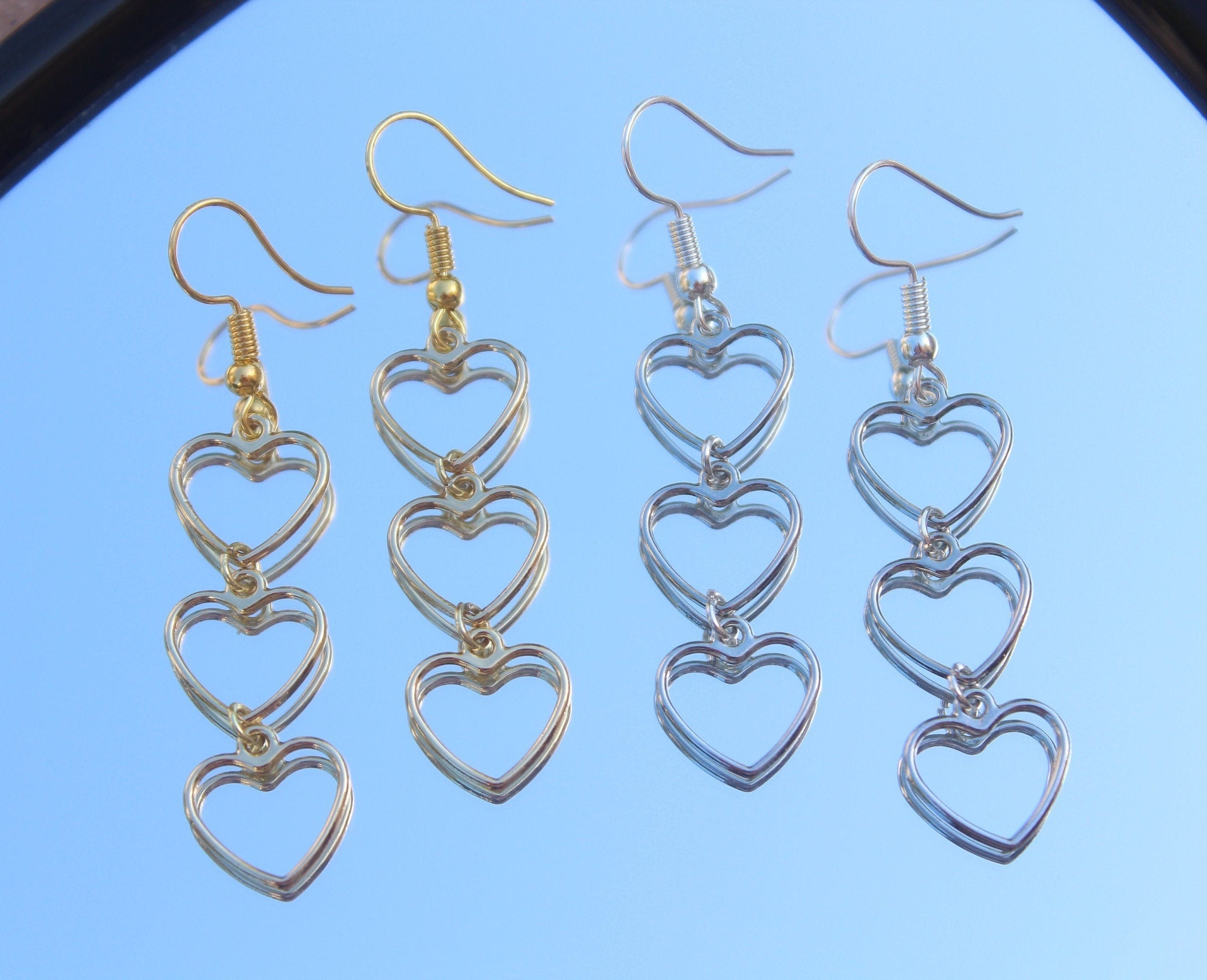 3 heart dangle earrings best sale