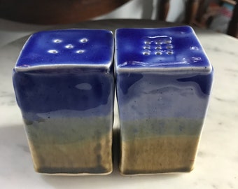 Asymmetric ceramic salt and pepper shakers, funky cool!