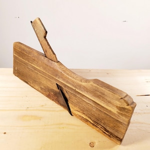 Vintage antieke timmermansvormvliegtuig - Vintage timmerwerkgereedschap