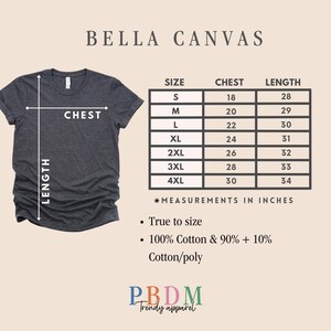 May include: A dark gray Bella Canvas t-shirt with a size chart showing chest and length measurements in inches. The chart includes sizes S to 4XL. The shirt is made of 100% cotton and 90% + 10% cotton/poly.