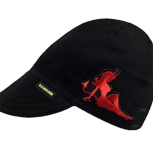 May include: Black welding cap with a red devil design and the text "U.S. WELDER" on the side.