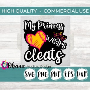 May include: A black and white design with the text "My Princess wears cleats" in a white cursive font. A pink heart with yellow stitching is in the center of the design. A small pink crown is above the heart. The design is on a black background.