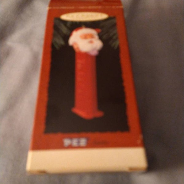 Hallmark keepsake ornament Pez Santa