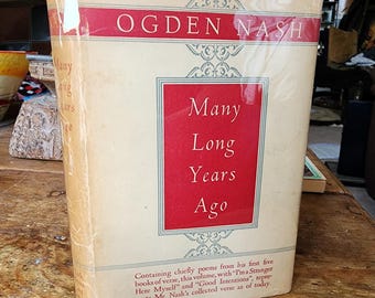 May include: A hardcover book titled "Many Long Years Ago" by Ogden Nash. The book has a cream-colored cover with red and gold accents. The title is in a red box, and the author's name is at the top.