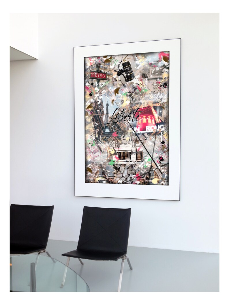 May include: A framed collage of images depicting Paris, France. The collage includes the Eiffel Tower, a red bus, a street sign that says "Liberte", and a vintage Parisian cafe. The collage is in a white frame and is hanging on a white wall.