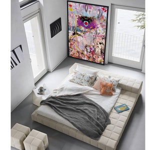 May include: A white platform bed with a gray throw blanket and pillows. The bed is in a modern bedroom with a large abstract painting on the wall.