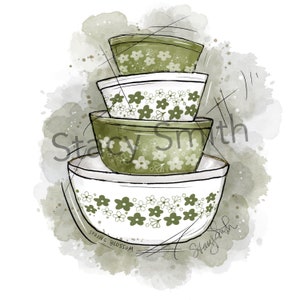May include: A set of four green and white mixing bowls with a floral pattern. The bowls are stacked on top of each other and the largest bowl has the words "Spring Blossom" written on the bottom.