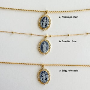 May include: Three gold chains with a pendant featuring a white cameo of the Virgin Mary. The chains are labeled "1mm rope chain", "Satellite chain", and "Edgy rolo chain".