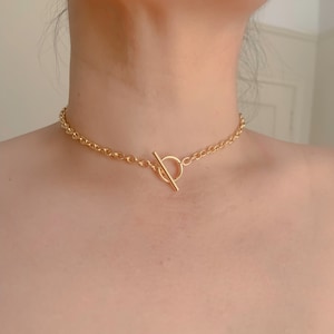 Collier ras de cou ovale avec chaîne en plaqué or 18 carats unisexe
