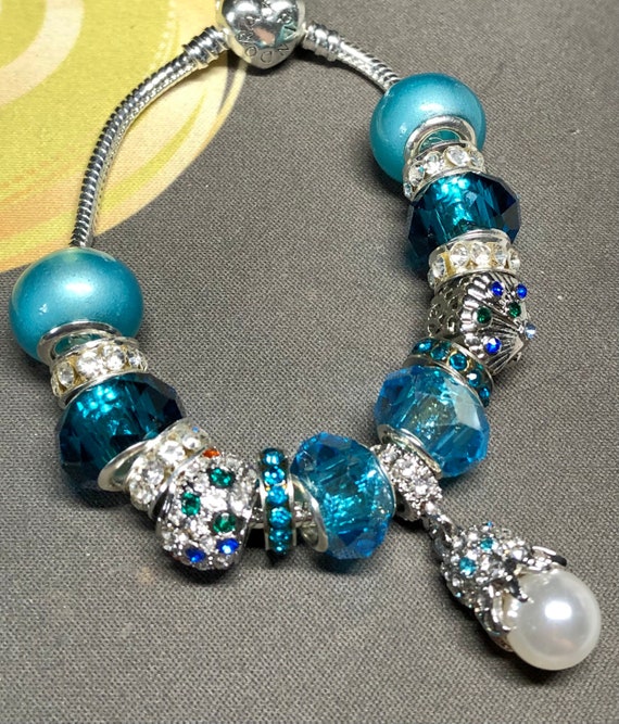 Pandora | Jewelry | Pandora Sparkling Pave Barrel Clasp Bracelet W 1 Blue Theme  Charms | Poshmark