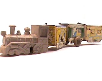 Tren de juguete antiguo de hojalata litografiada, de cuerda, para reparar