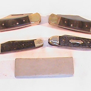 4 Lock Blade Pocket Knives With Sharpening Stone