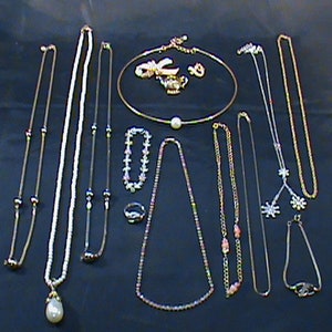 Vintage AVON Collection Of 9-Necklaces 2-Bracelets 7 1/2 Inch Ring 3-Lapel Pins