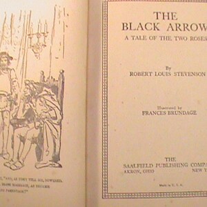 May include: A vintage book cover for "The Black Arrow" by Robert Louis Stevenson, illustrated by Frances Brundage. The cover features a black and white illustration of a scene from the book, with a man in a hat and a sword, and a woman in a long dress.