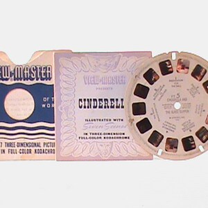 May include: A View-Master reel featuring the classic fairy tale Cinderella. The reel is illustrated with seven scenes from the story, including Cinderella and the glass slipper. The reel is labeled "View-Master Presents Cinderella Illustrated with Seven Scenes in Three Dimension Full-Color Kodachrome."