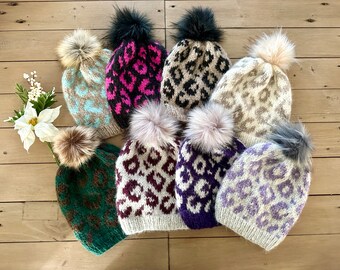 Women&#39;s Animal Print knit hat // Hand knit Beanie with animal print //Animal Attraction knit hat with faux fur pom