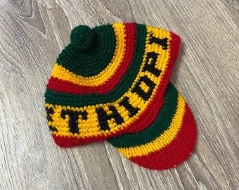 ETHIOPIA knitted hat. Vintage infant Ethiopian knit beanie with brim. Red, yellow, and green striped hat for baby or small child.