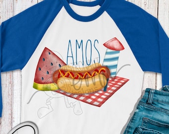 May include: A white and blue baseball tee shirt with a red, white, and blue Fourth of July themed design. The design includes a hot dog, watermelon, and a firework. The text "AMOS" is written in black on the shirt.