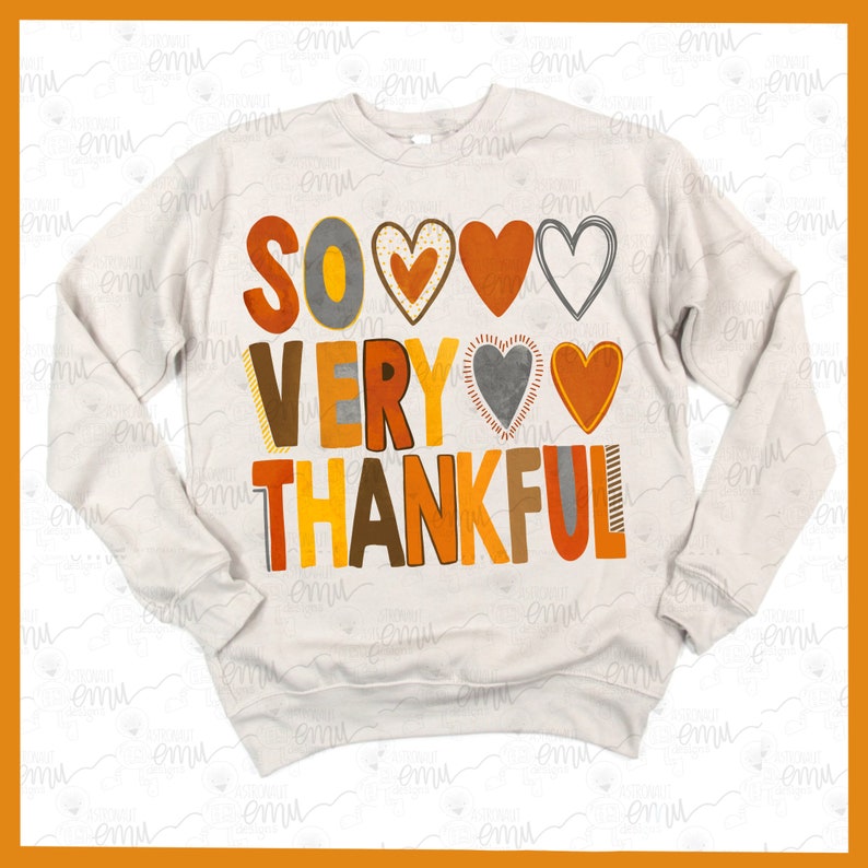 May include: A white sweatshirt with the text "SO VERY THANKFUL" in orange, yellow, brown, and gray letters. The text is decorated with hearts in various colors.