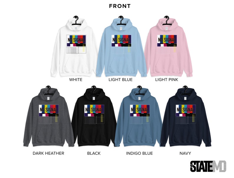 May include: A range of hooded sweatshirts in colours such as white, light blue, and pink. Each sweatshirt displays a graphic with the words "NO SIGNAL" above a colourful test pattern. Available colours include white, light blue, light pink, dark heather, black, indigo blue, and navy.