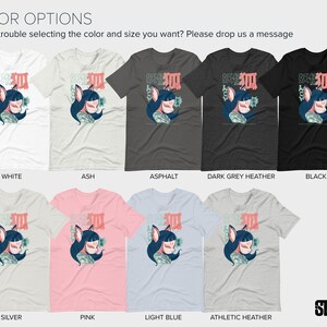 Peut inclure: Un t-shirt graphique repr&eacute;sentant une illustration stylis&eacute;e d'un renard portant un masque, entour&eacute; de caract&egrave;res japonais. Le t-shirt est disponible en 10 couleurs diff&eacute;rentes : blanc, gris clair, asphalt, gris fonc&eacute; chin&eacute;, noir, argent, rose, bleu clair, chin&eacute; athl&eacute;tique et noir.