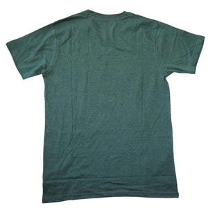May include: A dark green, short-sleeved t-shirt. The shirt is made of a soft, heathered fabric and has a crew neck. The back of the shirt is visible, showing the simple design and construction.