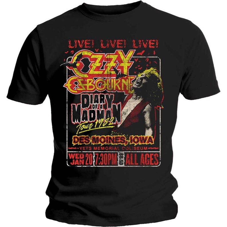 May include: Black t-shirt featuring a vintage concert poster design for Ozzy Osbourne's 1982 "Diary of a Madman" tour. The poster shows a date, time, and venue: "Wed 20 - 7:30pm, Vets Memorial Coliseum, All Ages". The poster states the location as "Des Moines, Iowa".