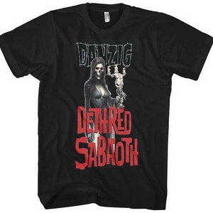May include: Black t-shirt with a graphic print of a woman in a black robe holding a candelabra. The text "Danzig" and "Deathred Sabaoth" is printed in red on the shirt.