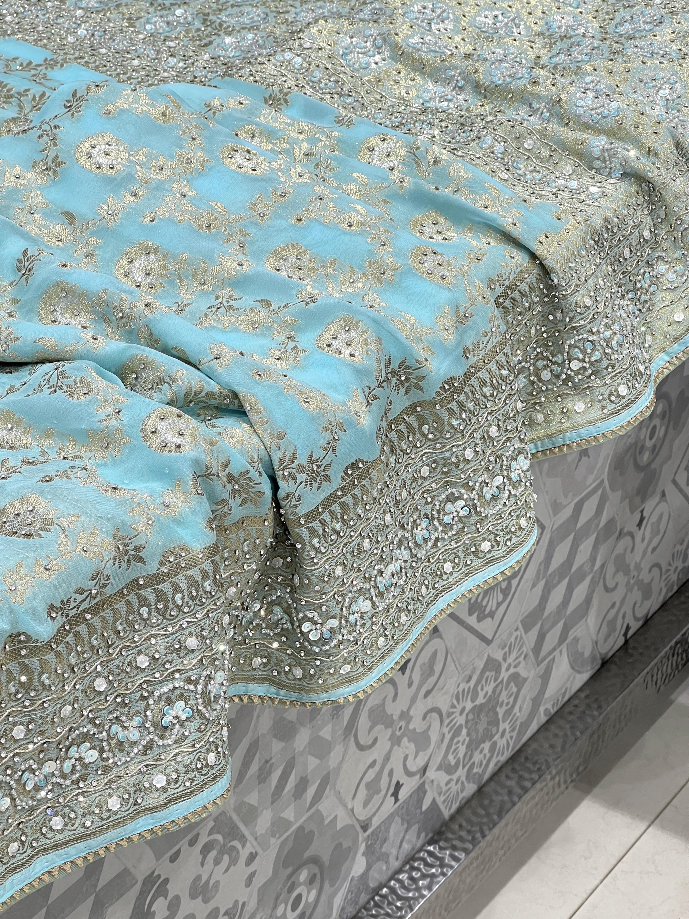 Blue Khaddi Georgette Hand Embroidery Saree
