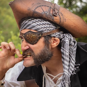 Pirate leather eye patch with engraving of the compass rose