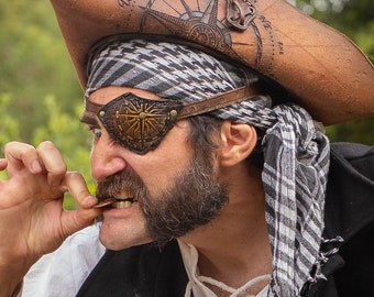 Pirate leather eye patch with engraving of the compass rose