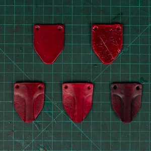 Red Leather scales to make an leather armor for larp armor