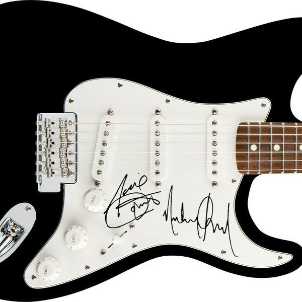 Michael and Janet Jackson Autographed Signed Guitar