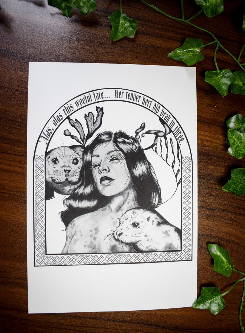 May include: Black and white illustration featuring a woman with long hair and two seals. The woman is surrounded by an arched border with text. The artwork has a detailed, artistic style, with a focus on the woman's expression and the seals' features.
