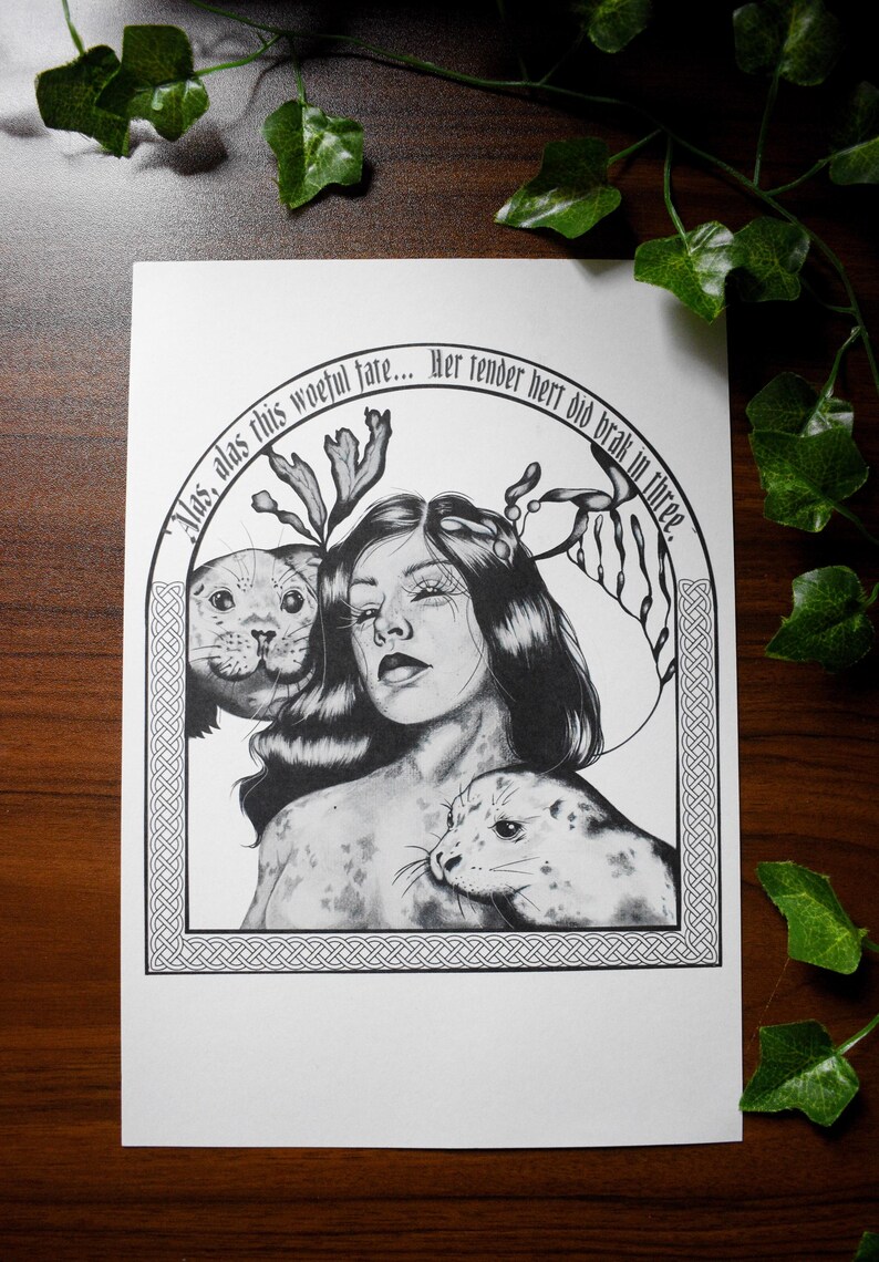 May include: Black and white illustration featuring a woman with long hair and two seals. The artwork includes text in an arch above the woman's head. The illustration has a detailed, artistic style.