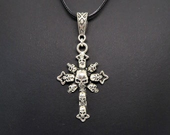 Bizarre and abstract handmade silver Crucifix of Skulls pendant Gothic style black adjustable cord necklace • dark jewellery • cross pendant