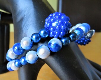 Beautiful and unique handmade bright blue and fluorescent white beaded wire wrap bracelet
