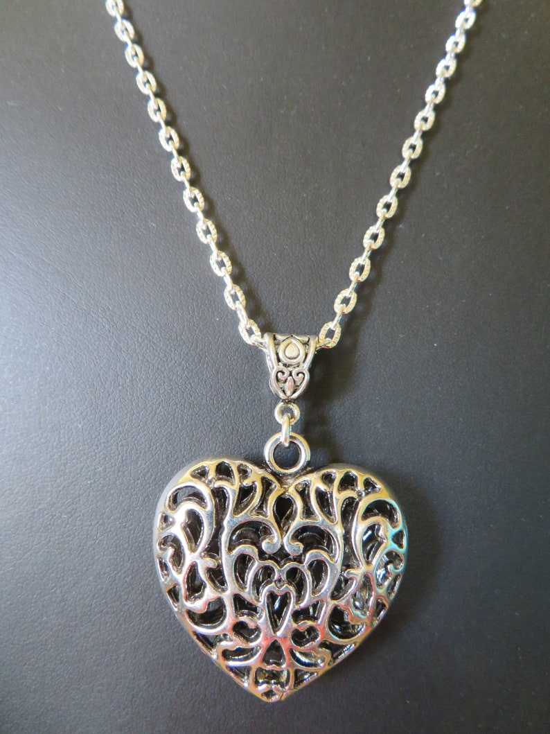 large silver patterned heart necklace.. unusual and gorgeous gift! Eye-catching