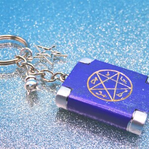 Purple Book of Shadows Sorceress Keyring: Cauldron & Star Charms, Witch Grimoire Bag Charm