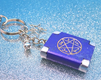 Special & wonderful purple Book of Shadows witch keyring with cauldron and stars charms • gifts for witches • Grimoire • handmade keychains