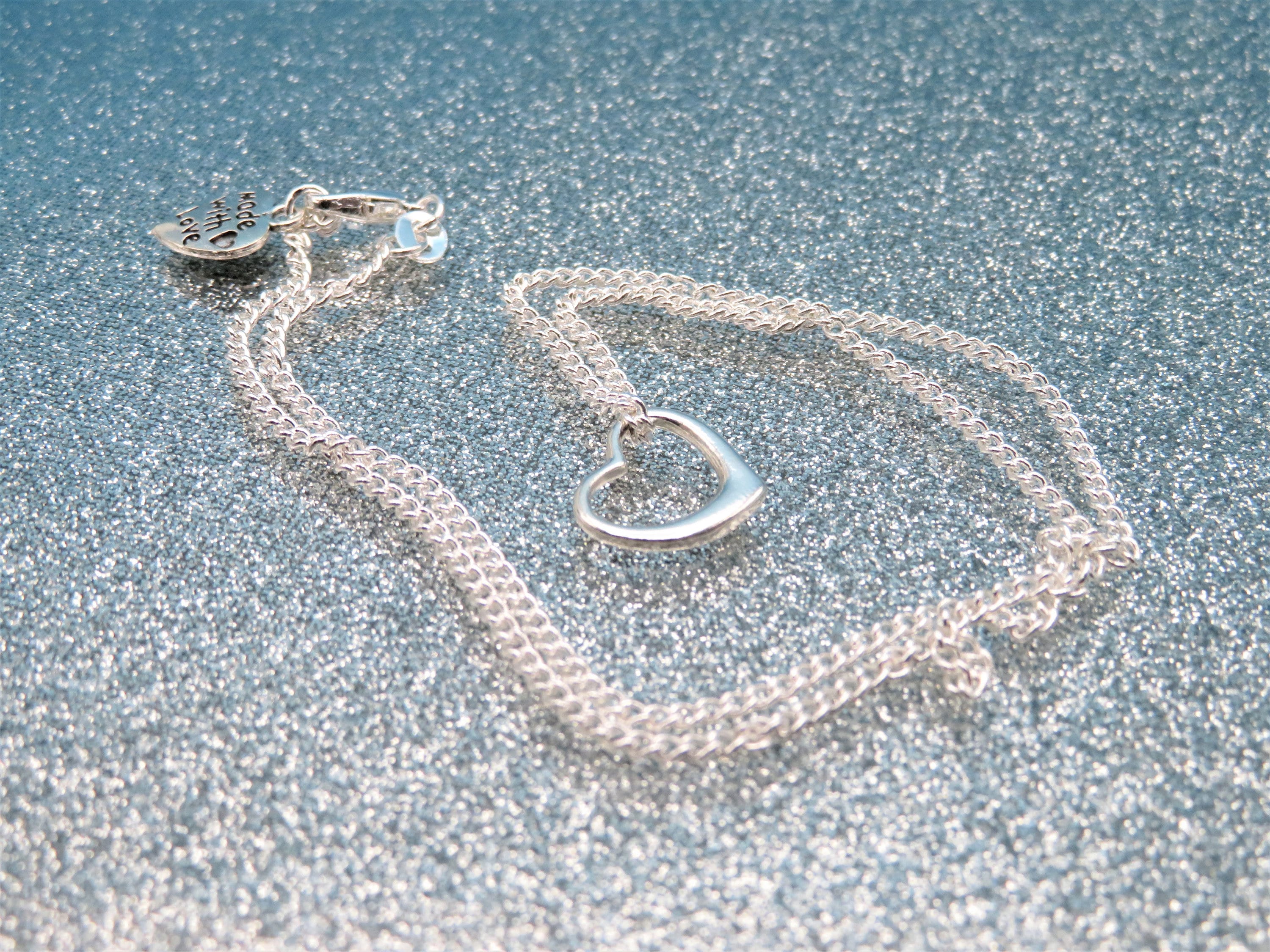 Collana con ciondolo a forma di cuore galleggiante in argento sterling: gioielli romantici - Italia