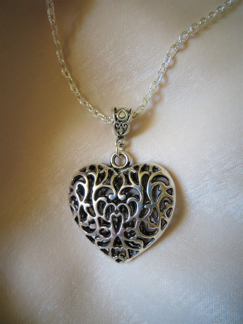 large silver patterned heart necklace.. unusual and gorgeous gift! Eye-catching