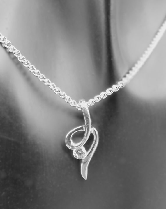 Elegant & Feminine 925 Sterling Silver Swirl Cubic Zirconia Elegant & Feminine 925 Sterling Silver Swirl Cubic Zirconia