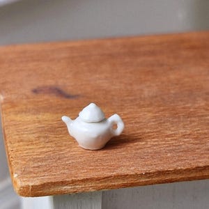 1:24 scale ceramic white teapot.