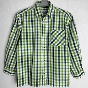 May include: Green and white plaid long-sleeve button-down shirt with a chest pocket.