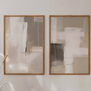 Neutrale nordische Eleganz: 2er-Set Abstrakte Kunstdrucke - Minimalistische, moderne Galerie-Wanddekoration für einen ruhigen, stilvollen Raum.