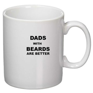 May include: White ceramic coffee mug with black text that reads "Dads with Beards Are Better".