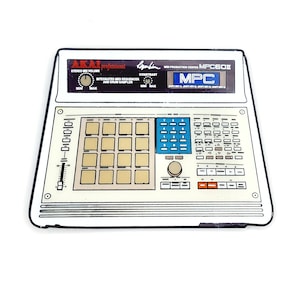 May include: A white and black illustration of an Akai MPC60II music production center. The illustration features the text "AKAI professional" and "MPC60II" on the front of the device. The device has a black and white screen with the text "MPC" on it. The device has a grid of 16 buttons and a large knob in the center.