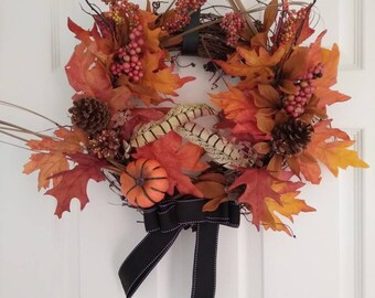 Fall leaves and a pumpkin