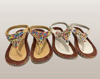 Sandales plate femmes style bohème orné de perle de rome